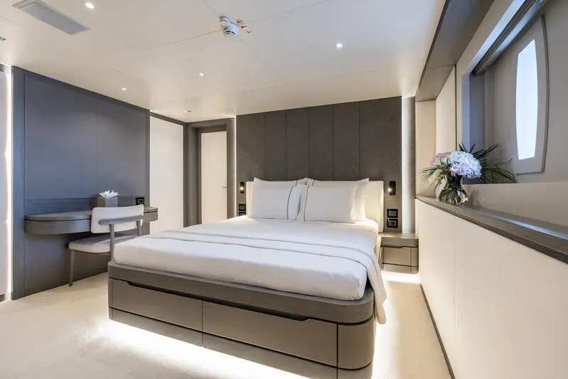 Fortuna Yacht Photos Pics Luxurious bedroom interior of 2022 CMB Yachts CMB 47, featuring modern design and elegant decor.