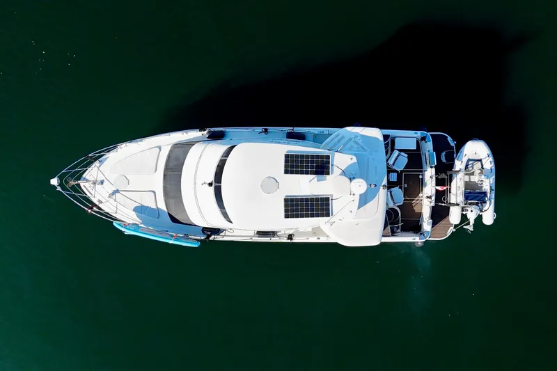 One Last Time II Yacht Photos Pics Aerial view of 2004 Carver 444 Cockpit Motor Yacht with solar panels on deck.