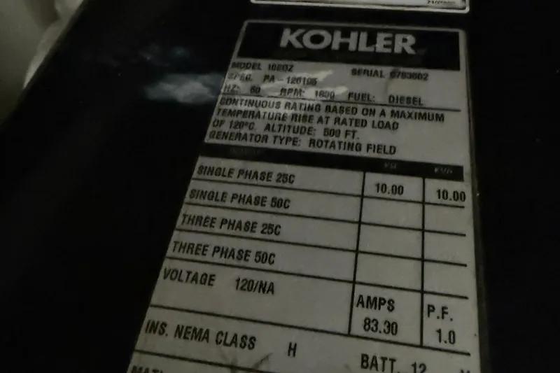 One Last Time II Yacht Photos Pics Kohler generator label on 2004 Carver 444 Cockpit Motor Yacht, diesel specifications.