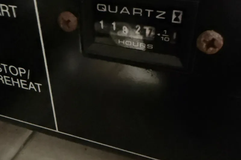 One Last Time II Yacht Photos Pics Hour meter reading 1182.7 hours on 2004 Carver 444 Cockpit Motor Yacht.