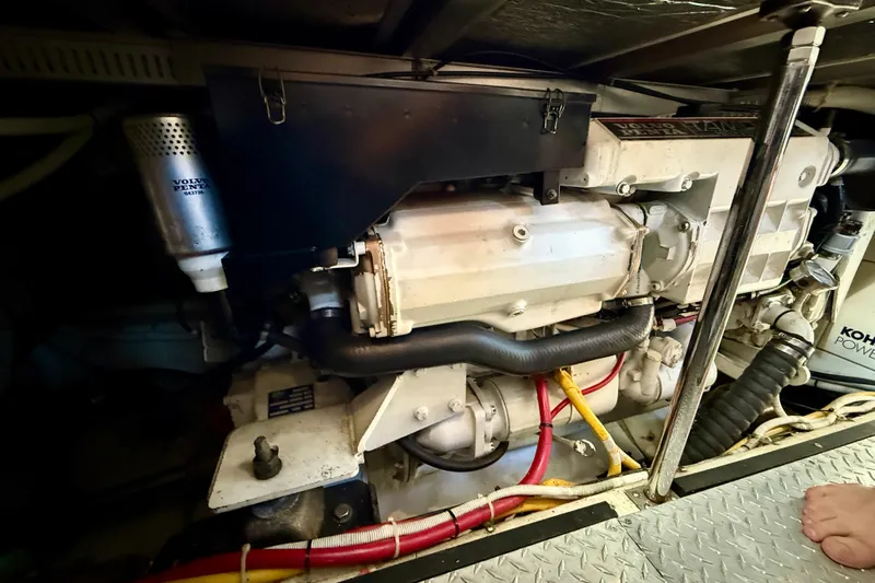 One Last Time II Yacht Photos Pics Engine room of 2004 Carver 444 Cockpit Motor Yacht with visible Volvo Penta components.