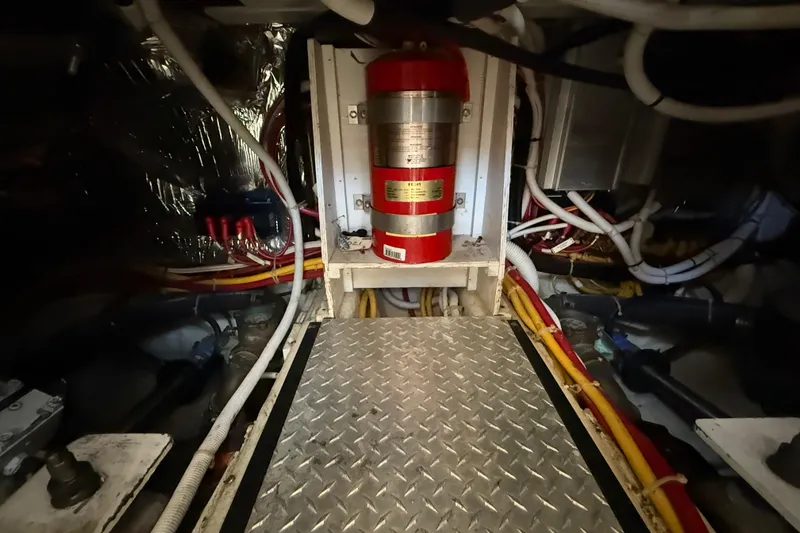 One Last Time II Yacht Photos Pics Engine room of 2004 Carver 444 Cockpit Motor Yacht with fire extinguisher and wiring.