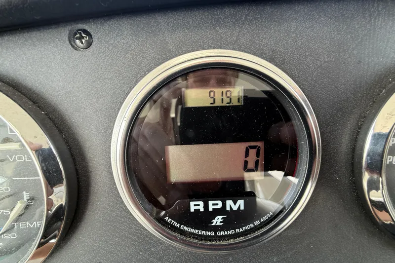 One Last Time II Yacht Photos Pics RPM gauge on 2004 Carver 444 Cockpit Motor Yacht dashboard.