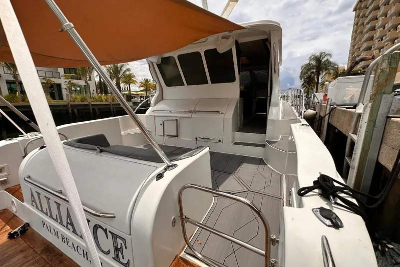  Yacht Photos Pics 2002 Navigator Californian Veneti yacht docked, featuring spacious deck and modern design.