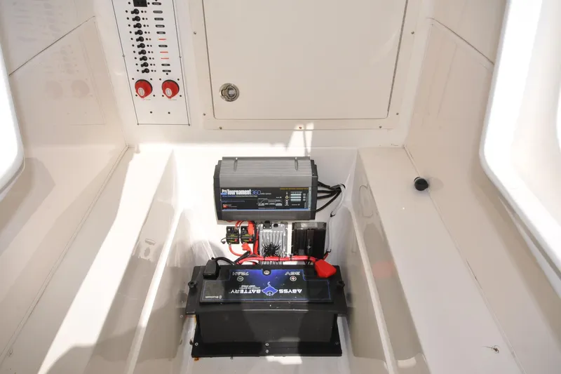  Yacht Photos Pics 2020 SeaVee 290B boat interior with battery and control panel.