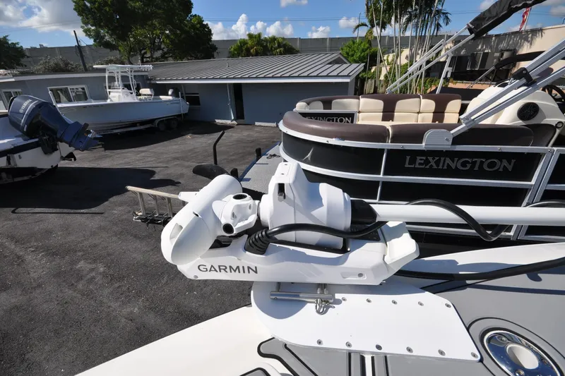  Yacht Photos Pics 2020 SeaVee 290B with Garmin equipment, parked near Lexington boat under clear sky.