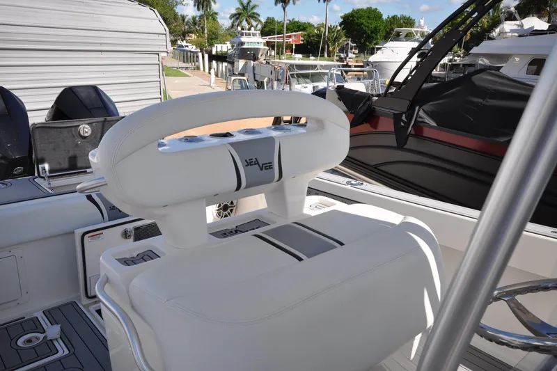  Yacht Photos Pics 2020 SeaVee 290B boat interior with white seating and modern design.