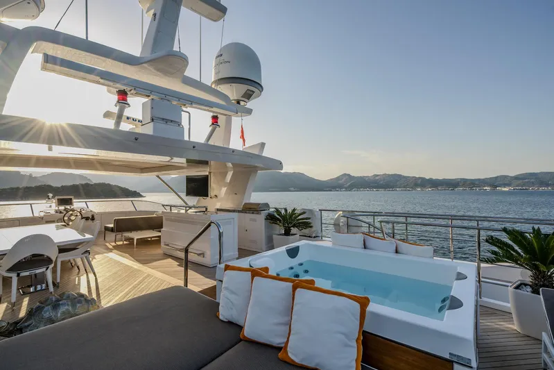Charisma Yacht Photos Pics Luxurious 2015 Benetti Fast 125 yacht deck with jacuzzi and scenic ocean view.