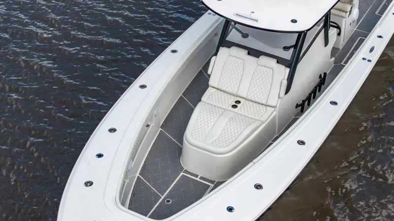 Catahoula Yacht Photos Pics 2023 Front Runner 39 Center Console boat on water, featuring sleek design and spacious deck.