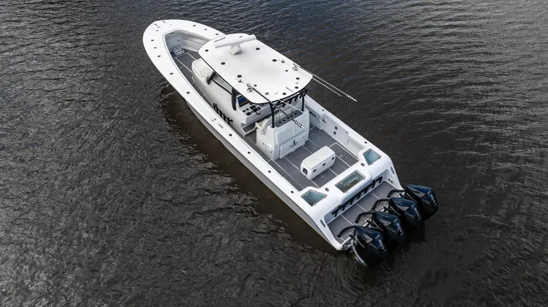 Catahoula Yacht Photos Pics 2023 Front Runner 39 Center Console boat on water, featuring four powerful outboard engines.