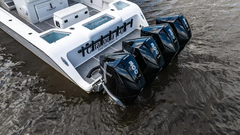 Catahoula Yacht Photos Pics 2023 Front Runner 39 Center Console boat with four powerful outboard engines in water.