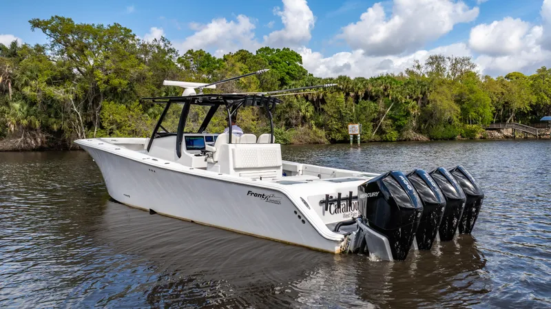 Catahoula Yacht Photos Pics 2023 Front Runner 39 Center Console boat with multiple outboard engines on a scenic river.