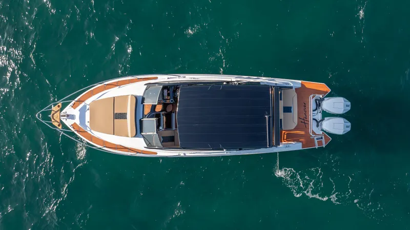  Yacht Photos Pics Aerial view of 2025 Hanover 305 yacht on open water.
