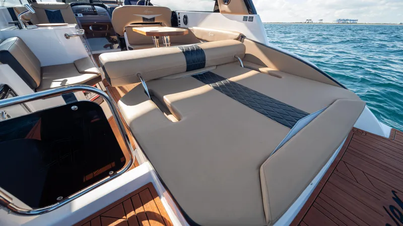  Yacht Photos Pics Luxurious Hanover 305 boat interior, 2025 model, with spacious seating and ocean view.