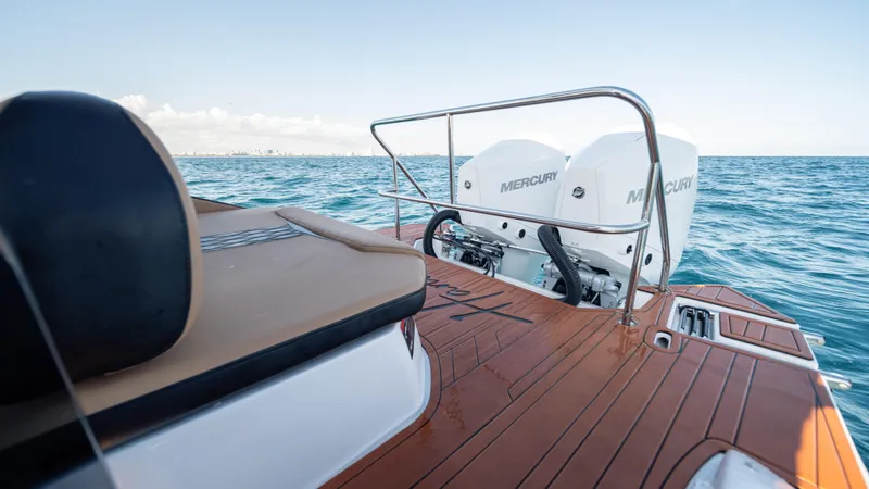  Yacht Photos Pics Luxury Hanover 305 boat with Mercury engines on open sea, 2025 model.