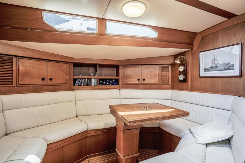 Hasard III Yacht Photos Pics dining / seating area converts to huge berth