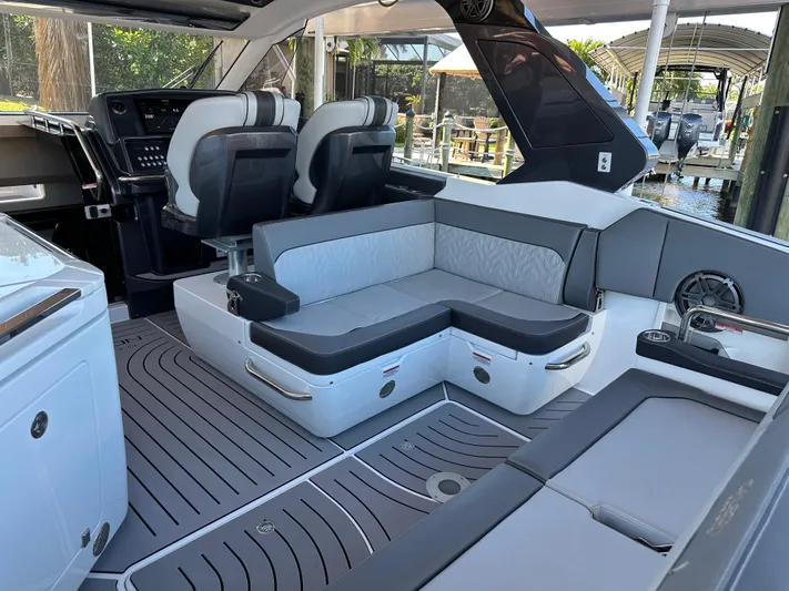  Yacht Photos Pics 2022 Galeon 325 GTO interior with modern seating and sleek design.