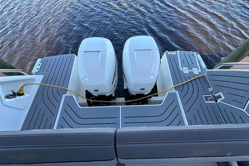  Yacht Photos Pics 2022 Galeon 325 GTO boat with dual outboard engines on water.
