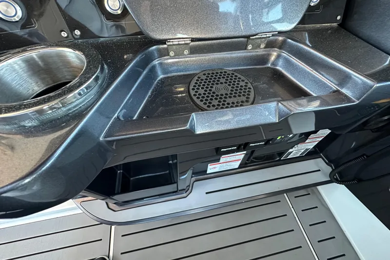  Yacht Photos Pics 2022 Galeon 325 GTO boat interior with cup holder and storage compartment.