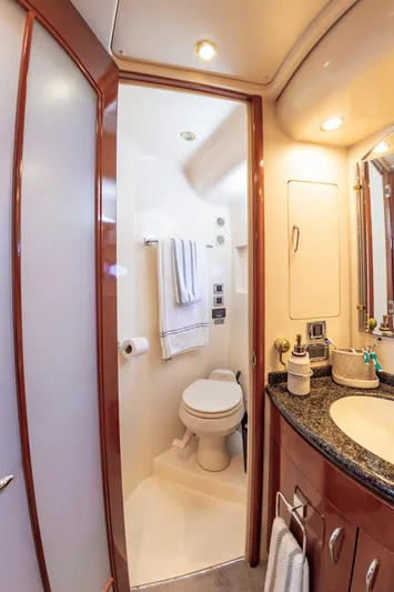 Spring Break Yacht Photos Pics Luxurious 2004 Carver Voyager yacht bathroom with modern amenities and elegant design.