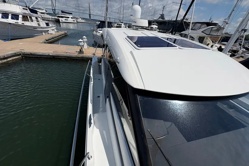  Yacht Photos Pics 2019 Jeanneau NC 33 docked at marina, showcasing sleek design and modern features.