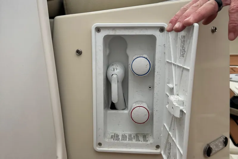  Yacht Photos Pics Control panel of 2022 Ranger Tugs R-31 CB boat with temperature knobs and handle.