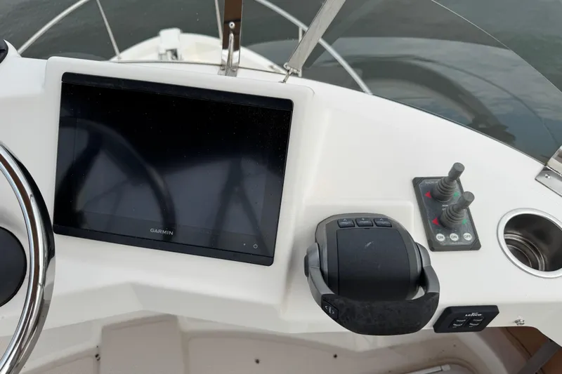  Yacht Photos Pics Control panel of 2022 Ranger Tugs R-31 CB with Garmin display and joystick controls.