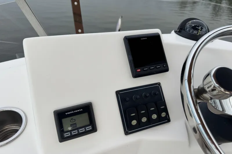  Yacht Photos Pics Control panel of 2022 Ranger Tugs R-31 CB with Garmin and Volvo Penta displays.