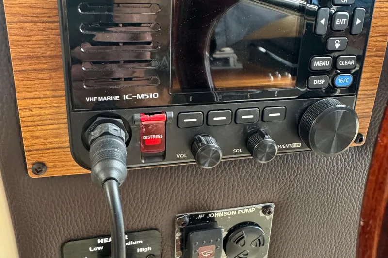  Yacht Photos Pics VHF marine radio controls on 2022 Ranger Tugs R-31 CB boat dashboard.