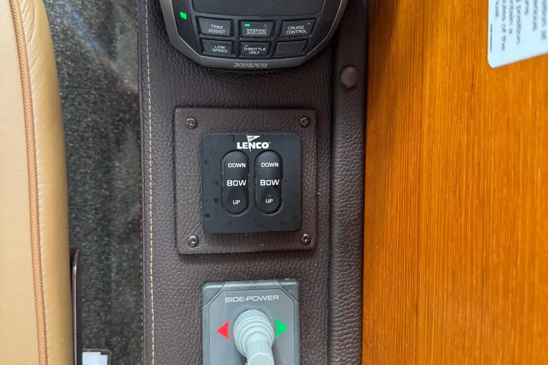  Yacht Photos Pics Control panel on 2022 Ranger Tugs R-31 CB boat, featuring Lenco and Side-Power systems.