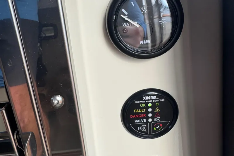  Yacht Photos Pics 2022 Ranger Tugs R-31 CB water gauge and propane fume detector panel.