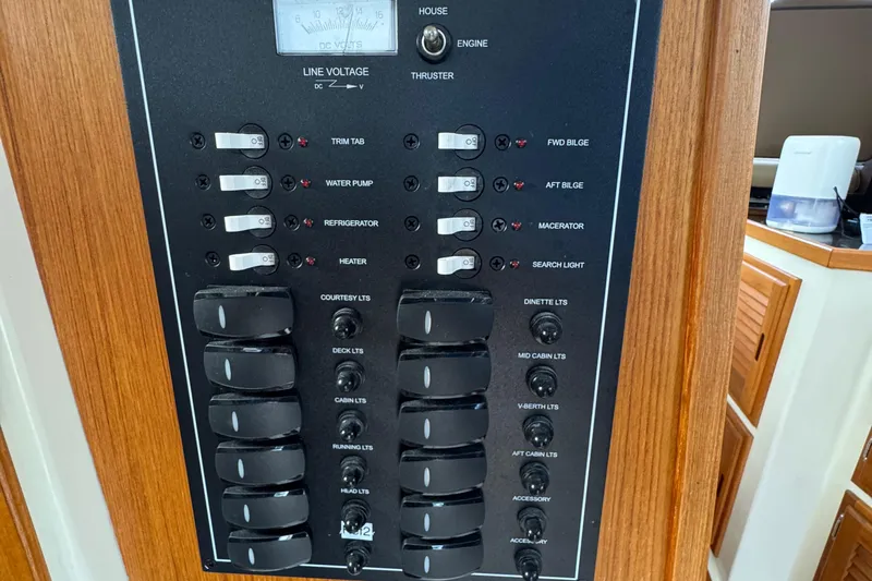  Yacht Photos Pics Electrical control panel on 2022 Ranger Tugs R-31 CB boat, featuring various switches and gauges.