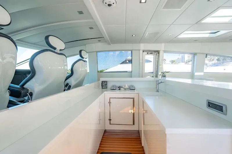 Venture Yacht Photos Pics Luxurious interior of 2007 Arno Leopard 31 yacht with sleek seating and modern design.