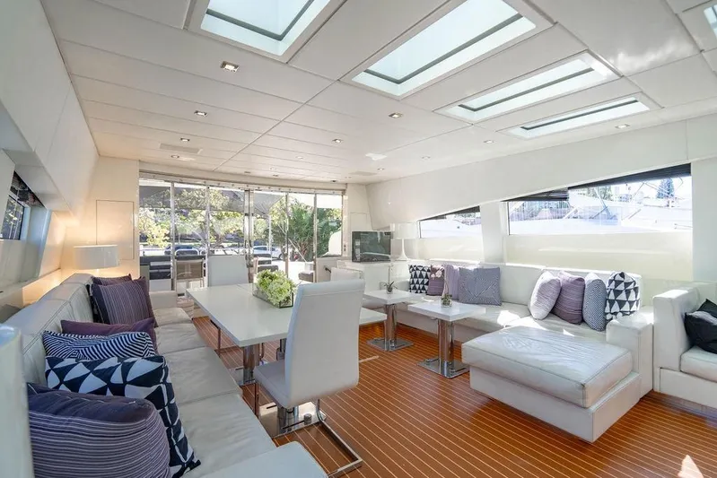 Venture Yacht Photos Pics Luxurious interior of 2007 Arno Leopard 31 yacht with modern seating and skylights.