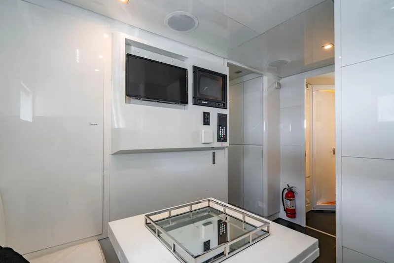 Venture Yacht Photos Pics Modern interior of 2007 Arno Leopard 31 yacht with sleek design and entertainment system.