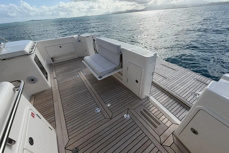  Yacht Photos Pics Luxurious deck of 2026 Riviera 505 SUV yacht with ocean view.