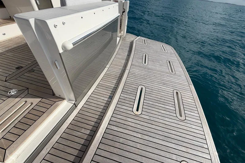  Yacht Photos Pics Teak deck of 2026 Riviera 505 SUV yacht with ocean view.