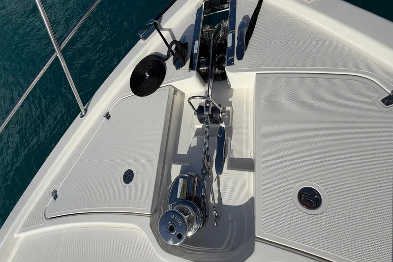  Yacht Photos Pics Bow deck of 2026 Riviera 505 SUV yacht with anchor system and storage compartments.