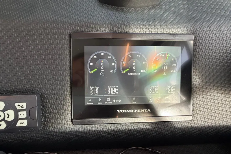  Yacht Photos Pics Dashboard display of 2026 Riviera 505 SUV with Volvo Penta engine metrics.