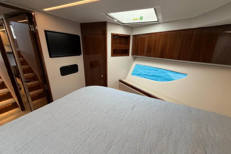  Yacht Photos Pics Luxurious interior of 2026 Riviera 505 SUV yacht with ocean view window.