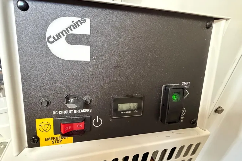  Yacht Photos Pics Control panel of a Cummins generator on a 2026 Riviera 505 SUV boat.