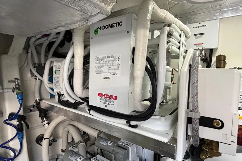  Yacht Photos Pics Engine room of 2026 Riviera 505 SUV with Dometic air conditioning system.