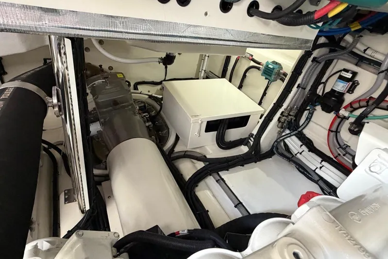  Yacht Photos Pics Engine room of 2026 Riviera 505 SUV, showcasing advanced mechanical components and wiring.