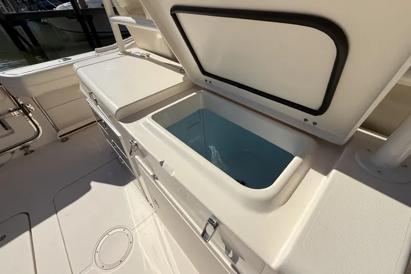  Yacht Photos Pics Open storage compartment on 2020 Grady-White Canyon 326 boat deck.