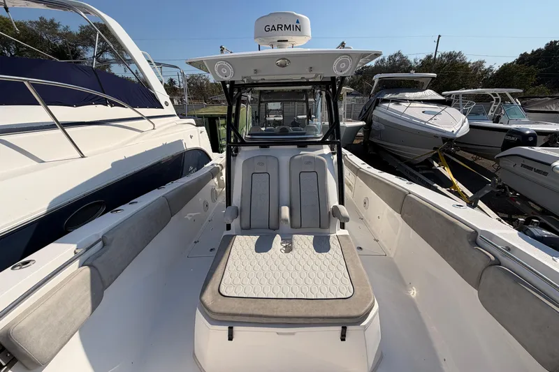  Yacht Photos Pics 2020 Sea Fox 328 Commander boat with Garmin equipment, docked among other boats.