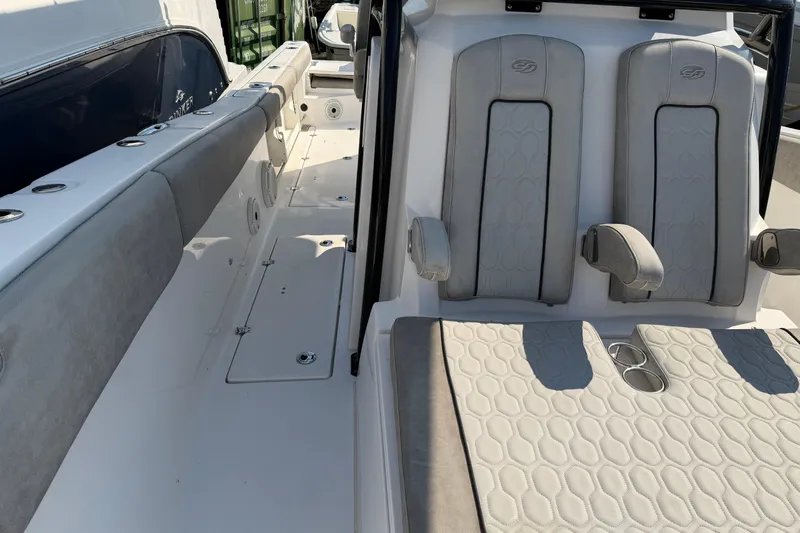  Yacht Photos Pics 2020 Sea Fox 328 Commander boat interior with cushioned seating and armrests.