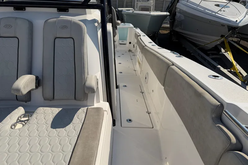  Yacht Photos Pics 2020 Sea Fox 328 Commander boat interior with cushioned seating and sleek design.