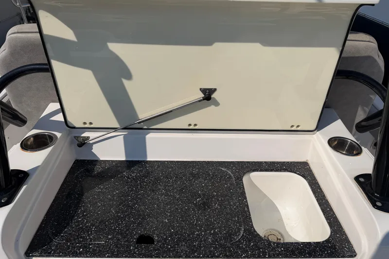  Yacht Photos Pics 2020 Sea Fox 328 Commander boat interior with storage compartment and sink.
