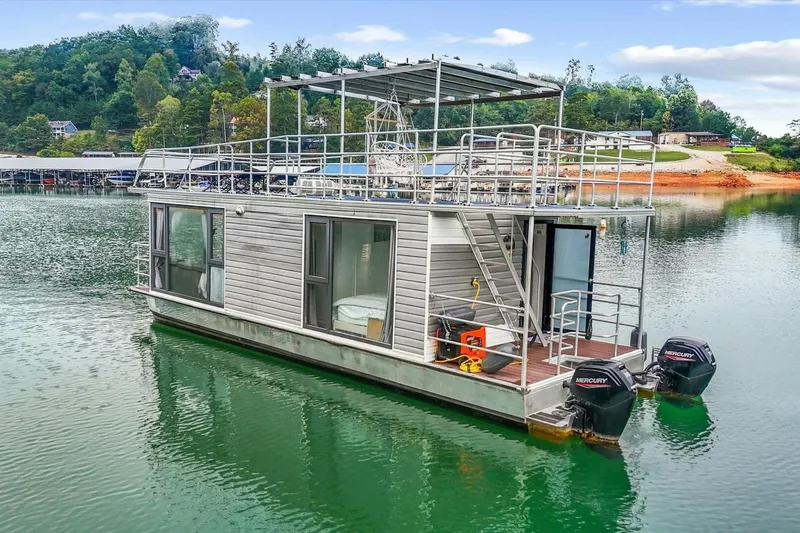  Yacht Photos Pics Houseboat on a lake, Gospel 39 model, 2024, with dual Mercury engines.