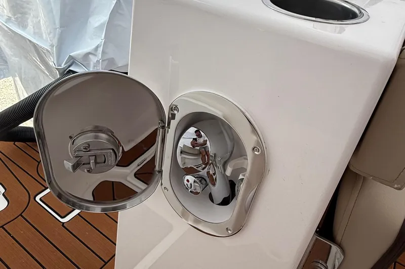  Yacht Photos Pics Fuel cap on 2025 Ranger Tugs R-25 boat, featuring sleek stainless steel design.